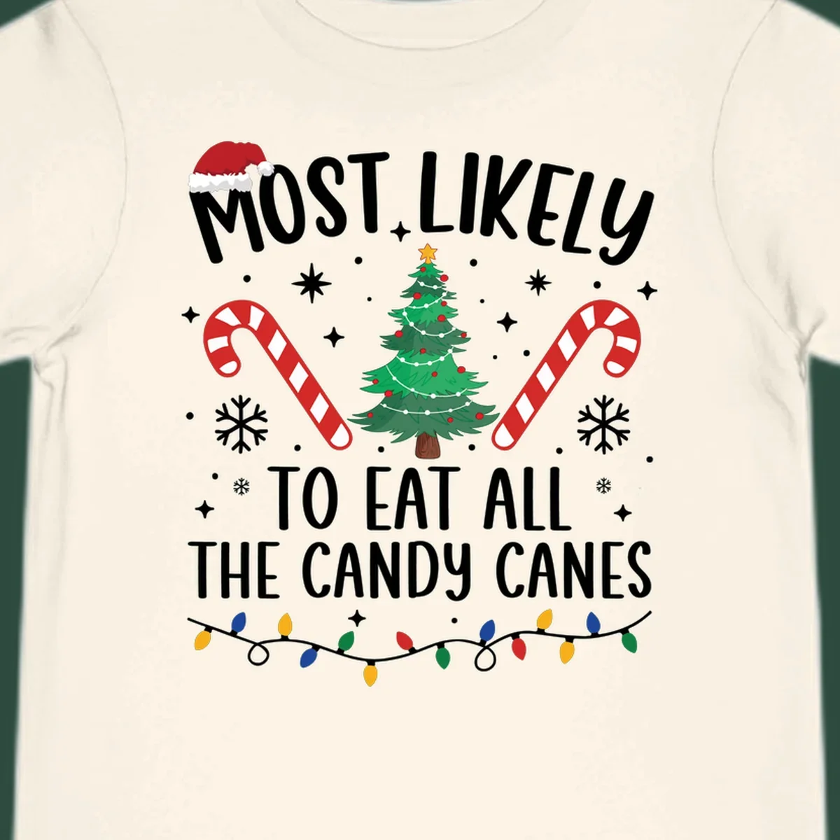 Most likely to eat all candy canes Christmas design with text, tree, candy canes, and lights.
