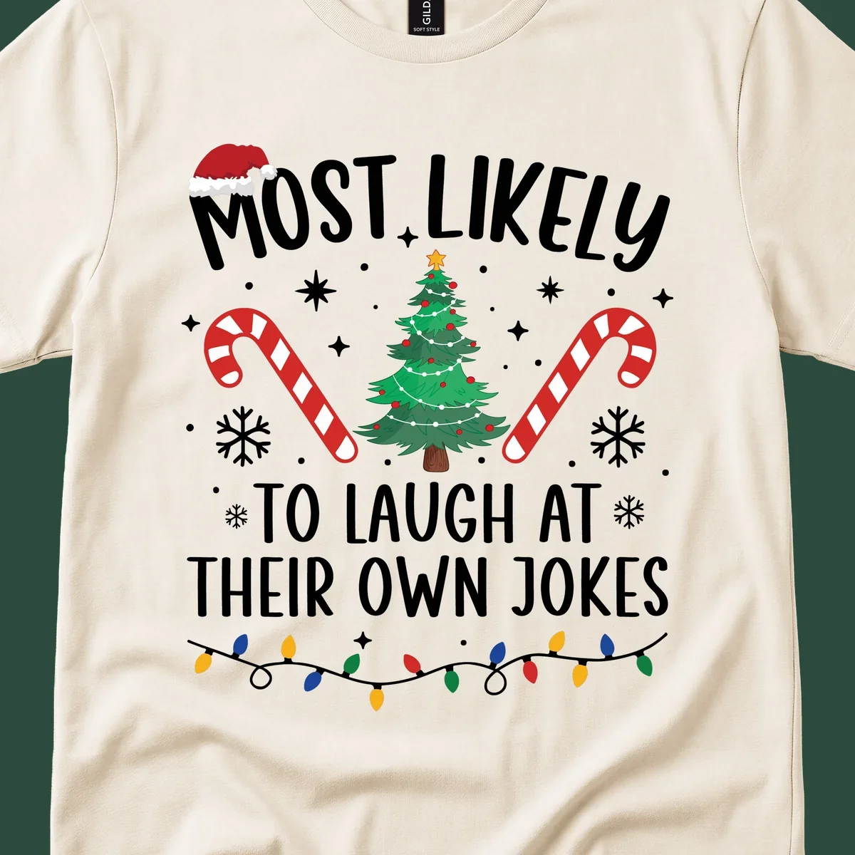 Most Likely To Laugh At Their Own Jokes Christmas design with text and festive elements.