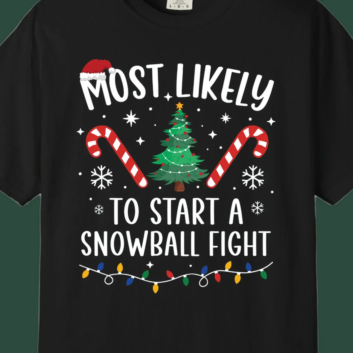 Most Likely To Start A Snowball Fight Christmas design with text, santa hat, tree, candy canes, and lights.