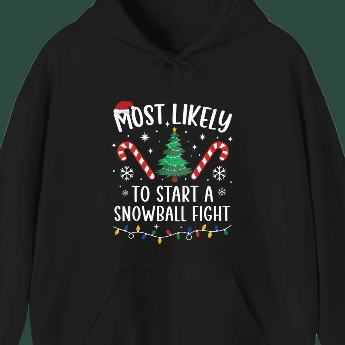 Most Likely To Start A Snowball Fight Christmas design with text, santa hat, tree, candy canes, and lights.