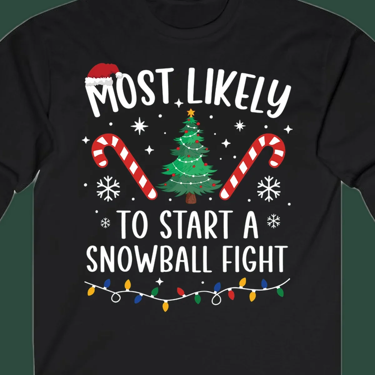 Most Likely To Start A Snowball Fight Christmas design with text, santa hat, tree, candy canes, and lights.