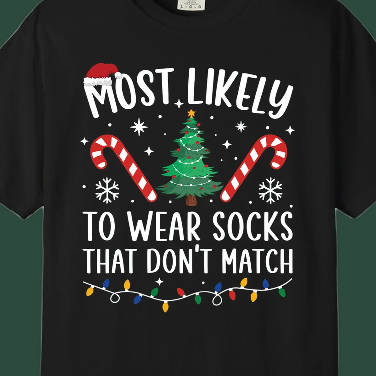 Most Likely To Wear Mismatched Socks Christmas design with text, Santa hat, tree, candy canes, and lights.