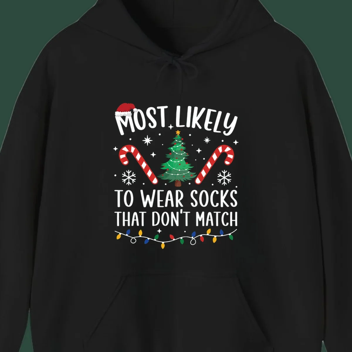 Most Likely To Wear Mismatched Socks Christmas design with text, Santa hat, tree, candy canes, and lights.