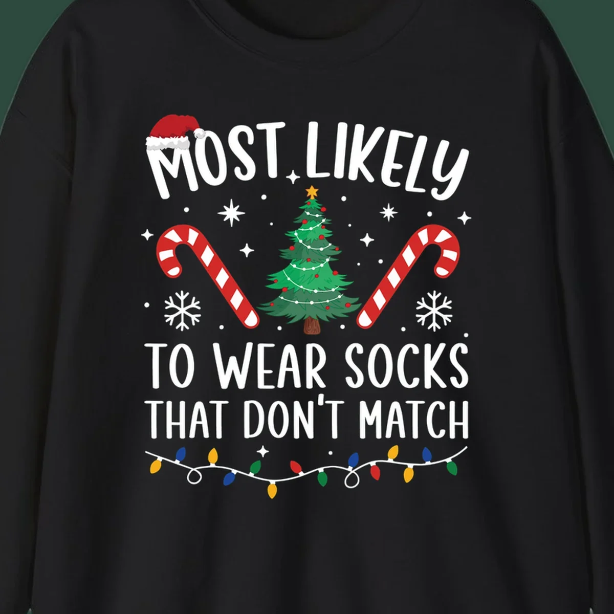 Most Likely To Wear Mismatched Socks Christmas design with text, Santa hat, tree, candy canes, and lights.