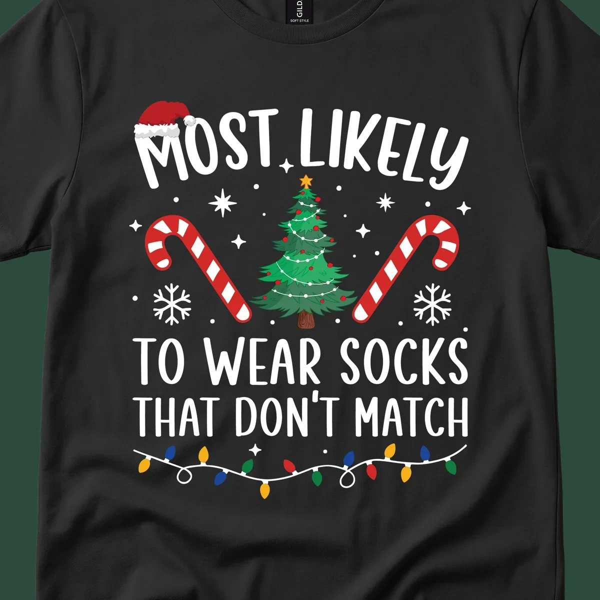 Most Likely To Wear Mismatched Socks Christmas design with text, Santa hat, tree, candy canes, and lights.