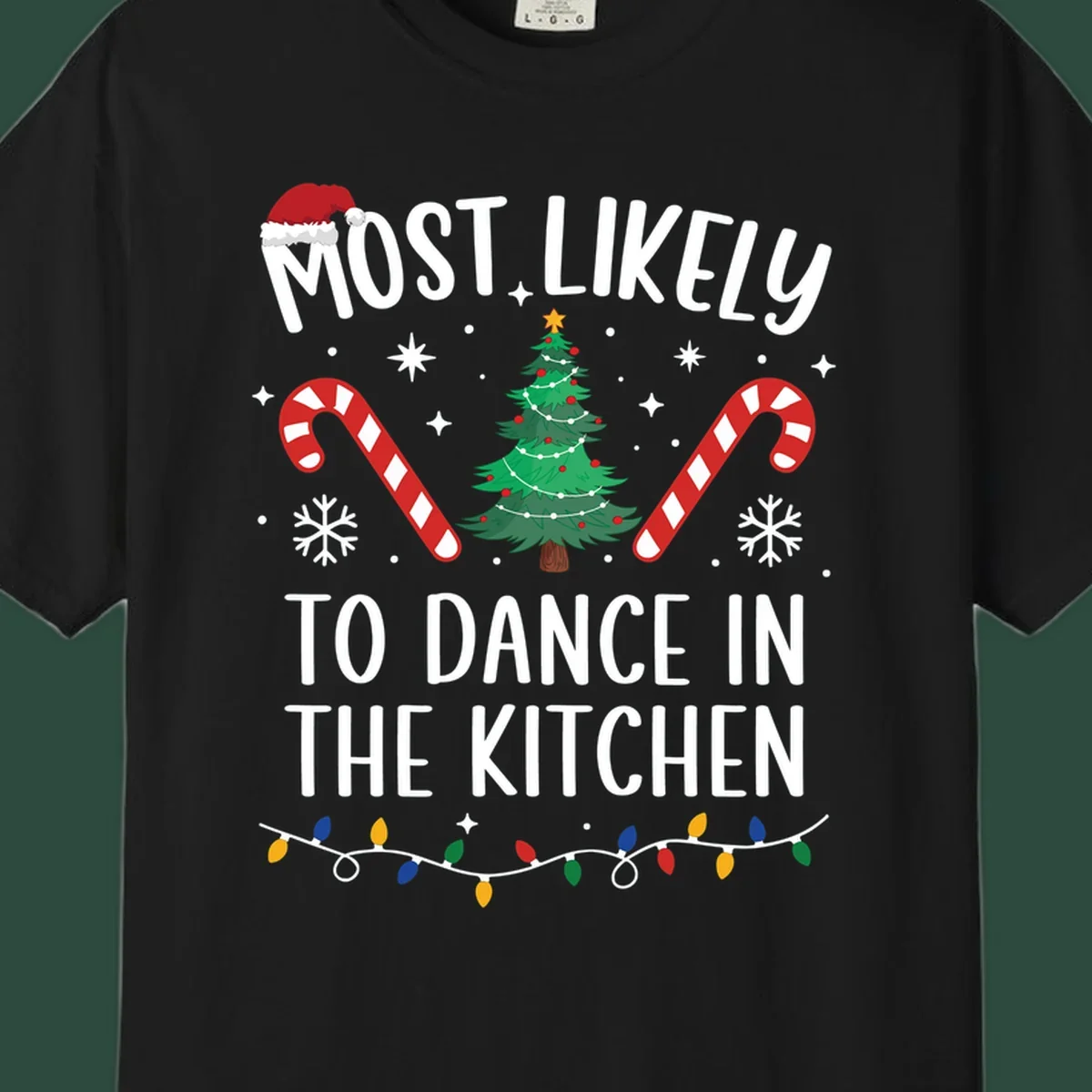 Most Likely To Dance In The Kitchen Christmas text with festive holiday graphics. christmas-design.
