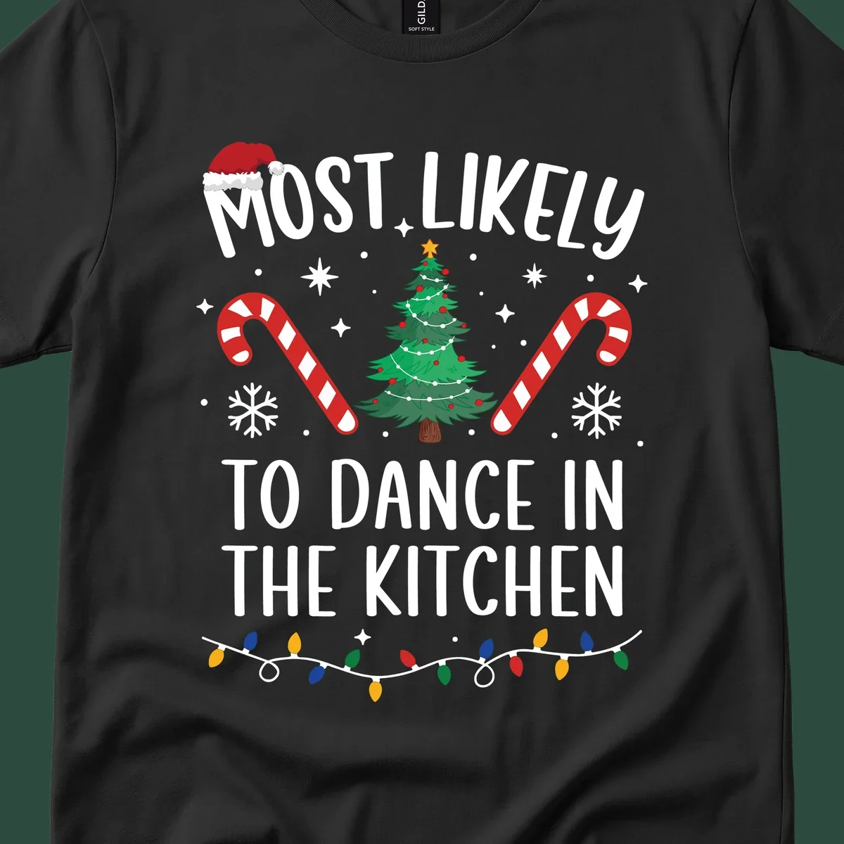 Most Likely To Dance In The Kitchen Christmas text with festive holiday graphics. christmas-design.