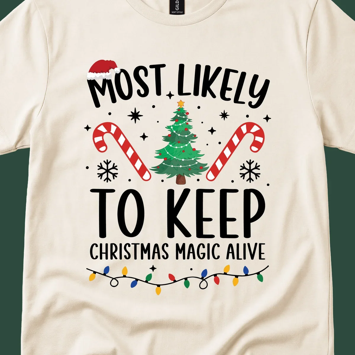 Text reads 'Most Likely To Keep Christmas Magic Alive' with festive Christmas graphics like a Santa hat, tree, and candy canes.