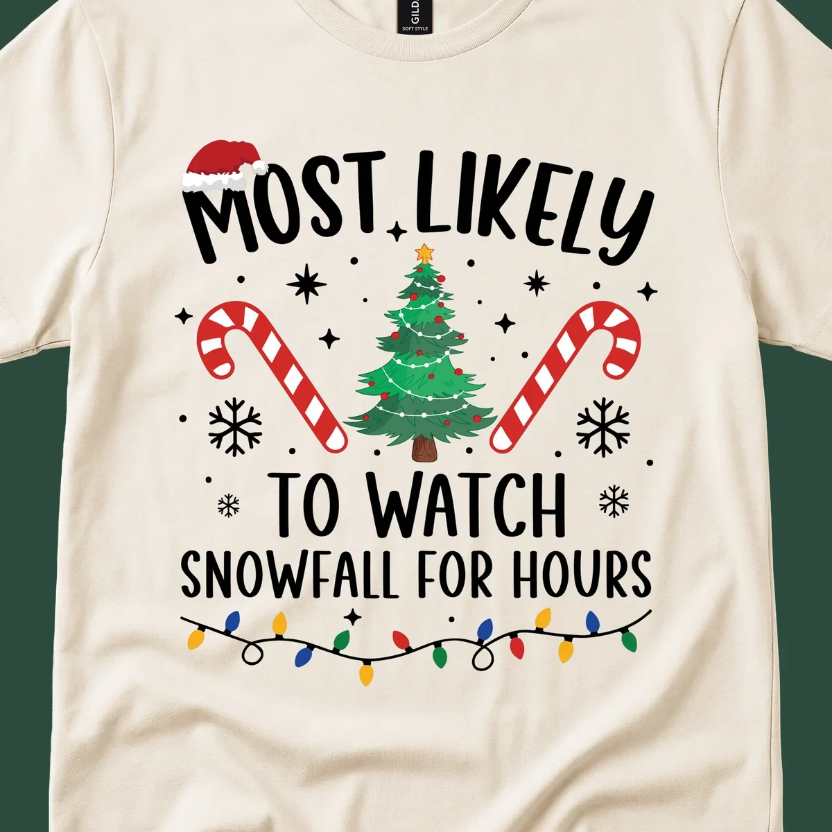 Most Likely To Watch Snowfall For Hours Christmas design with festive elements.
