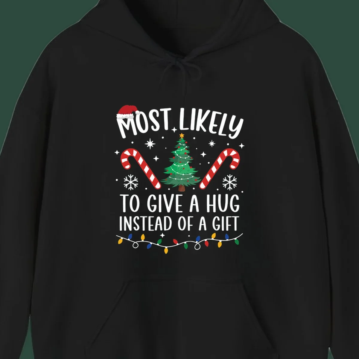 Most Likely To Give A Hug Christmas Design with text, tree, candy canes, and lights.