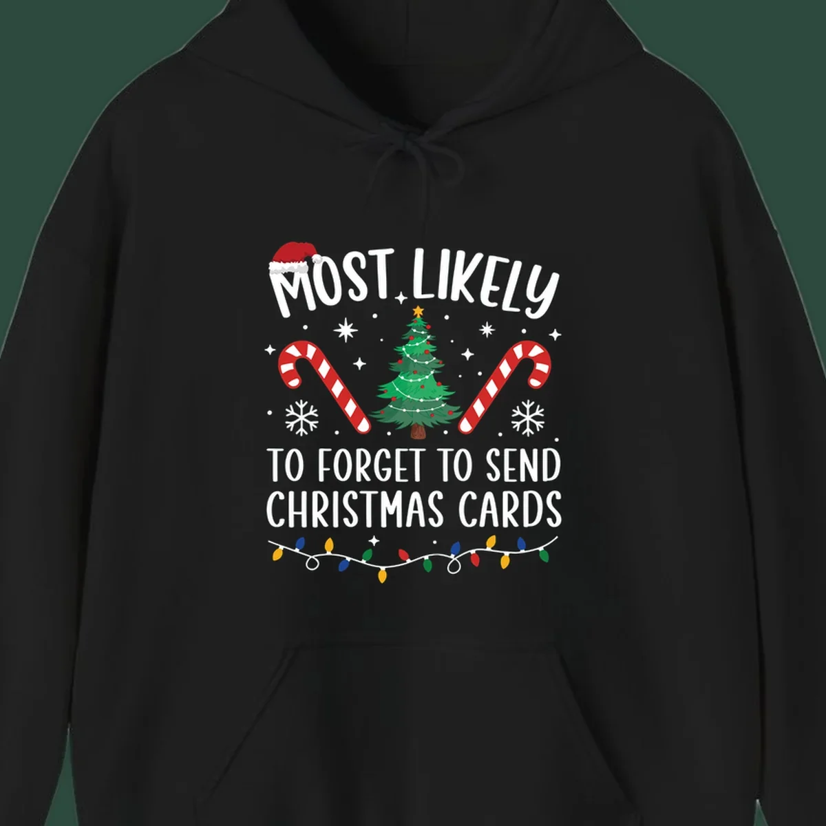 Text and graphics for "Most Likely To Forget Christmas Cards" design, featuring a Santa hat, tree, and candy canes.