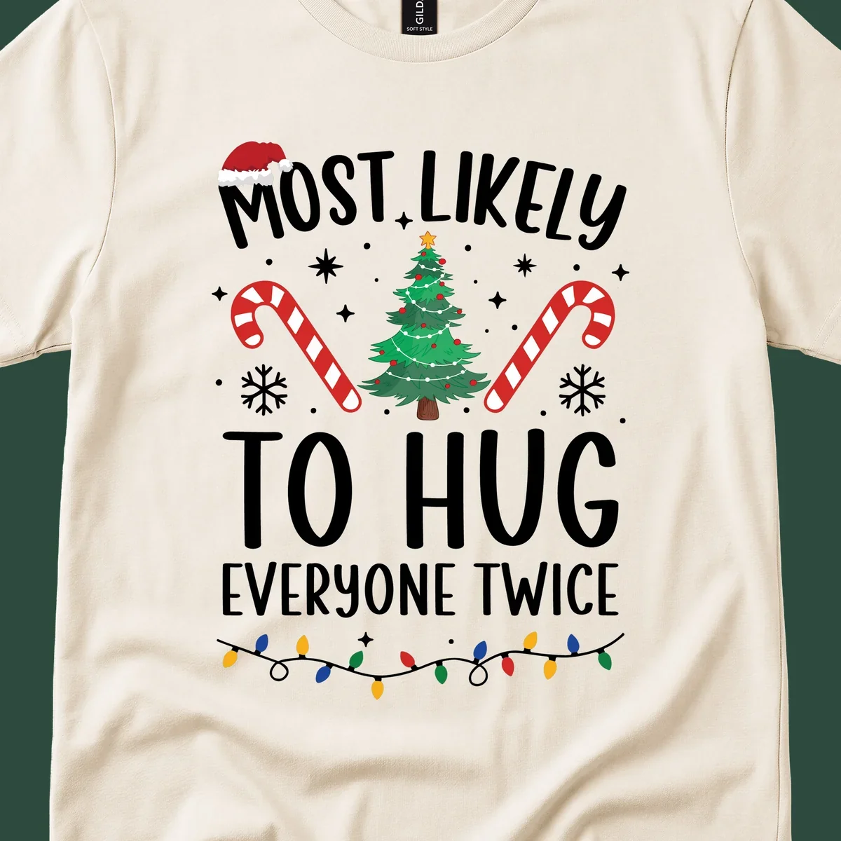 Most Likely To Hug Everyone Twice Christmas design with text, tree, candy canes, and Santa hat.
