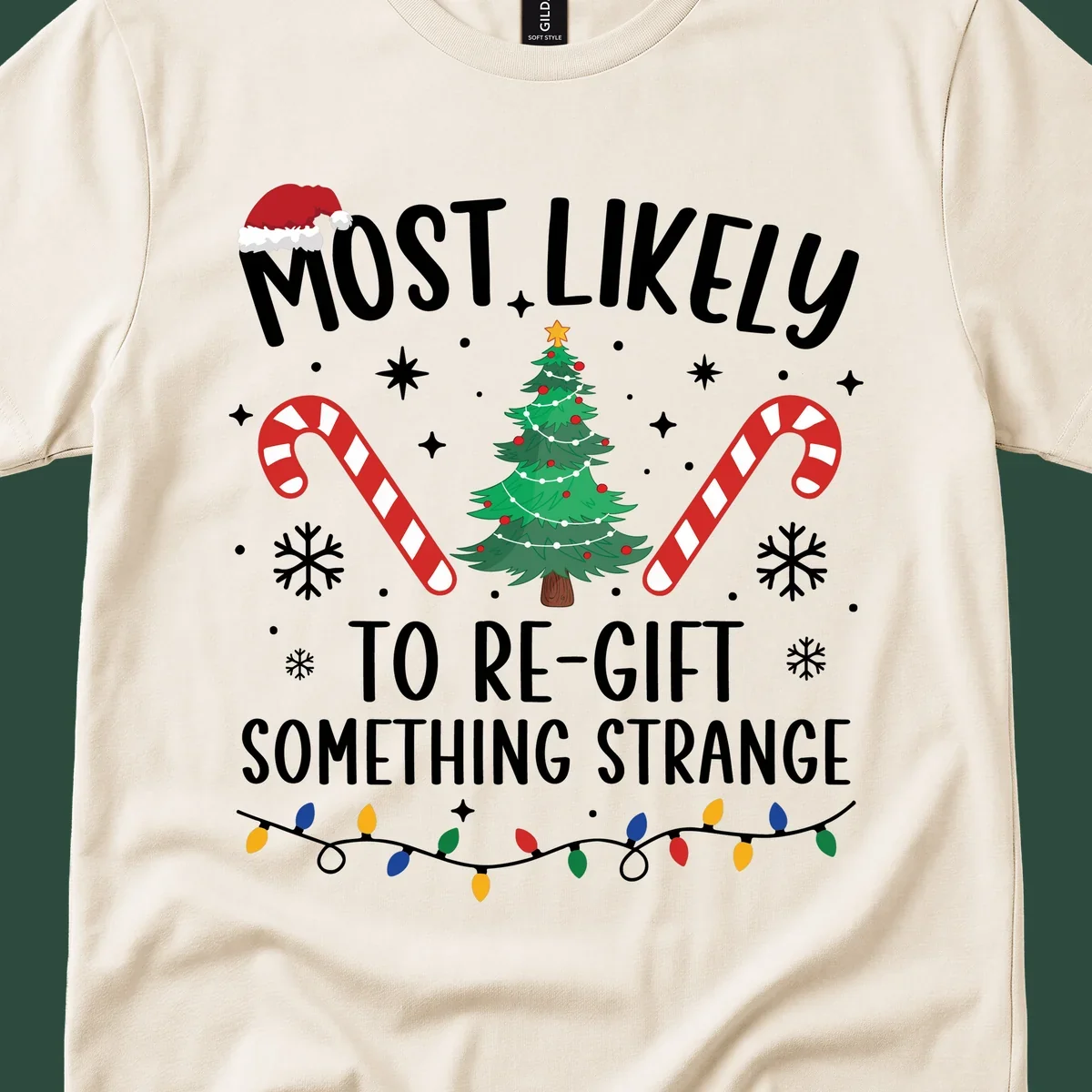 Most Likely To Re-Gift Something Strange holiday quote design with Christmas elements. 