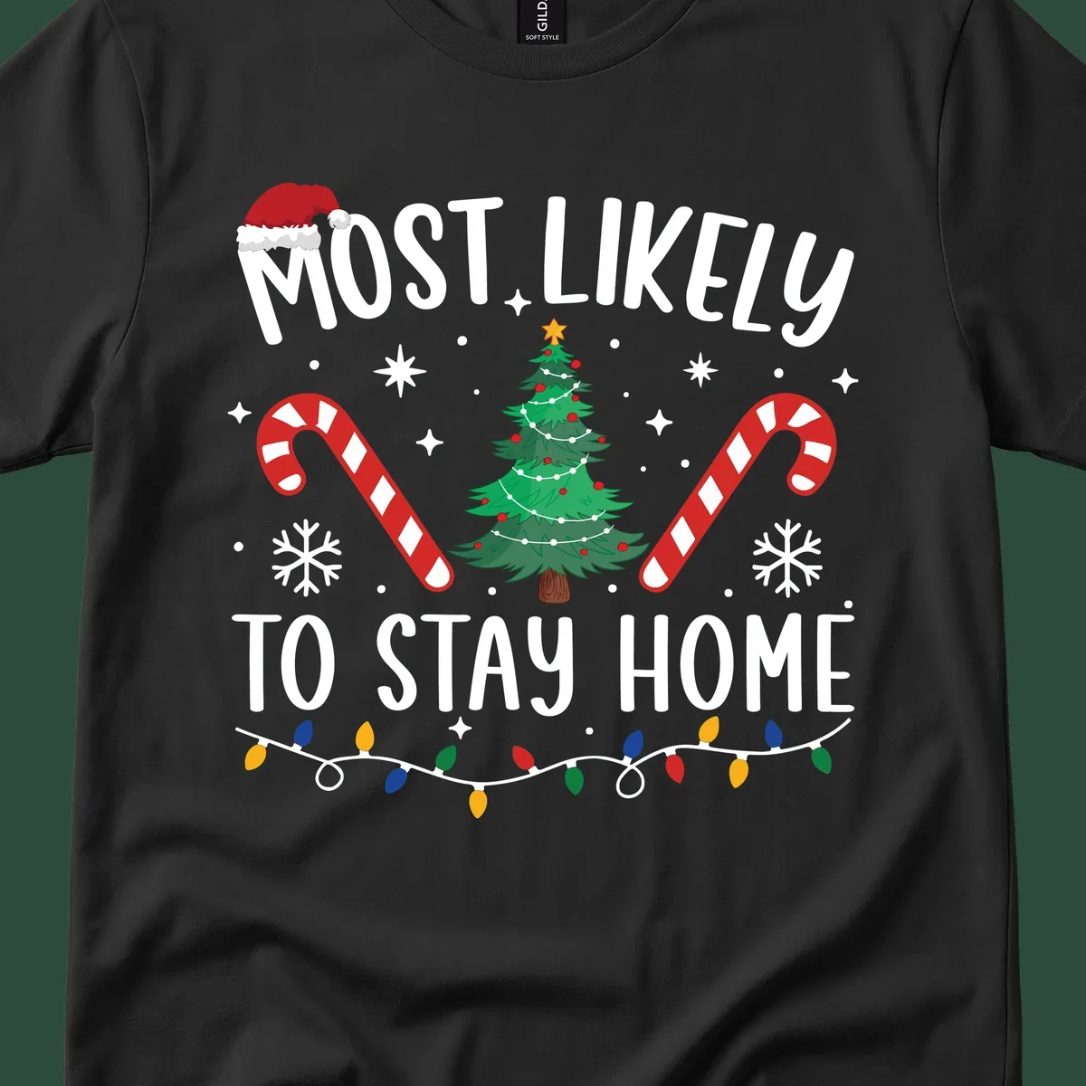Most likely to stay home Christmas design with text, tree, candy canes, and lights.