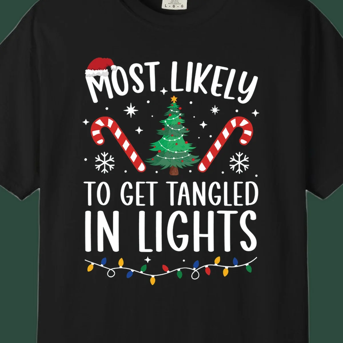 Most Likely To Get Tangled In Lights text with christmas tree, candy canes, and santa hat.