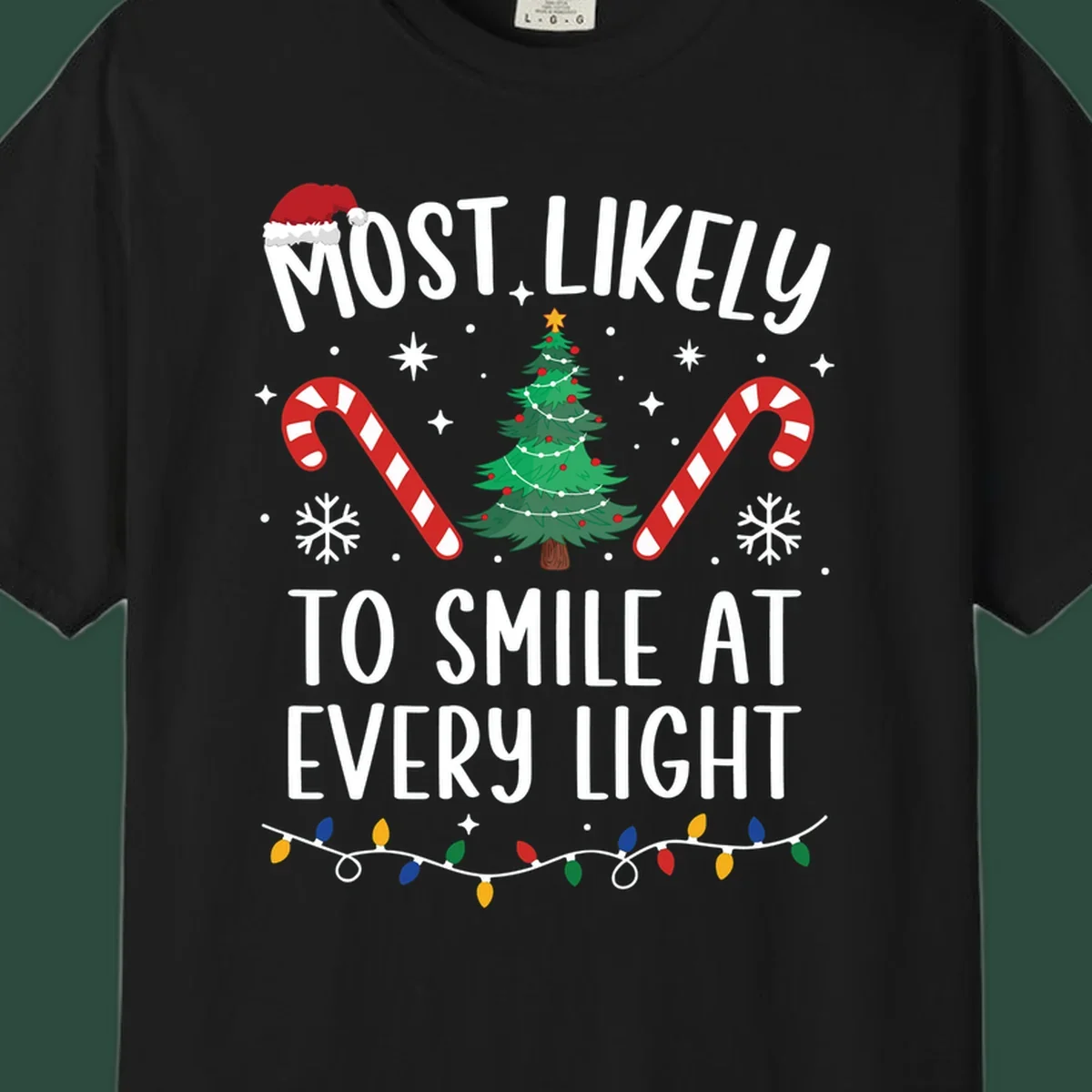 Most Likely To Smile At Every Light Christmas design with tree, candy canes, and lights.