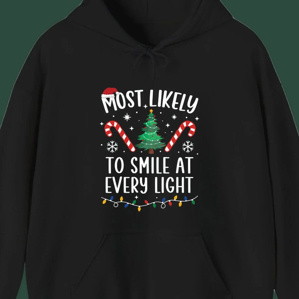 Most Likely To Smile At Every Light Christmas design with tree, candy canes, and lights.