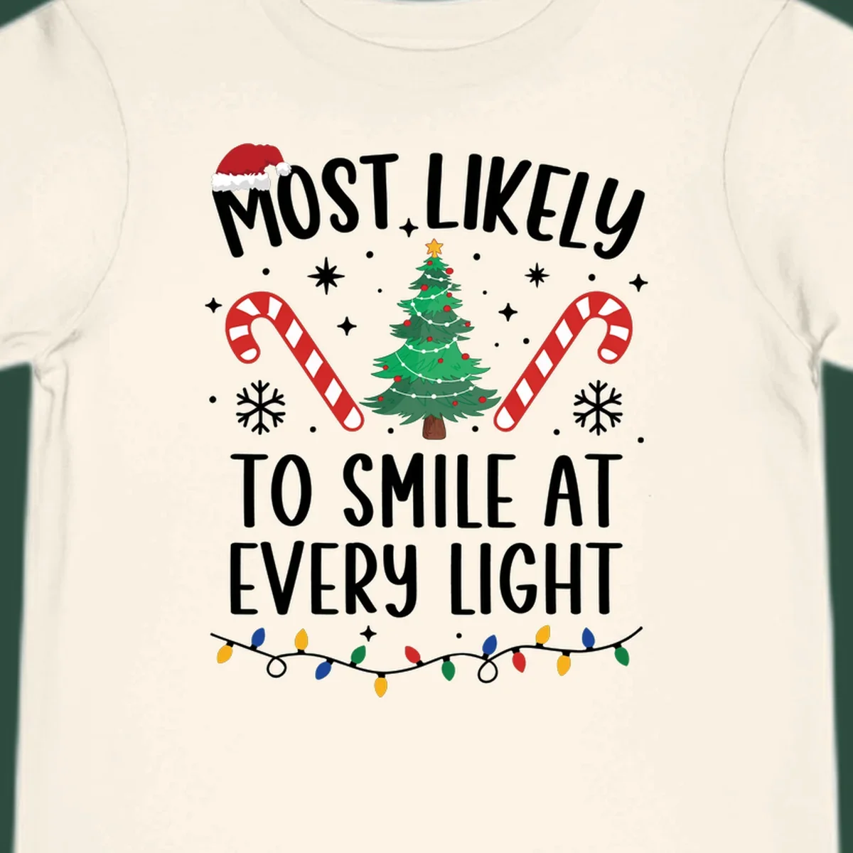 Most Likely To Smile At Every Light Christmas design with tree, candy canes, and lights.