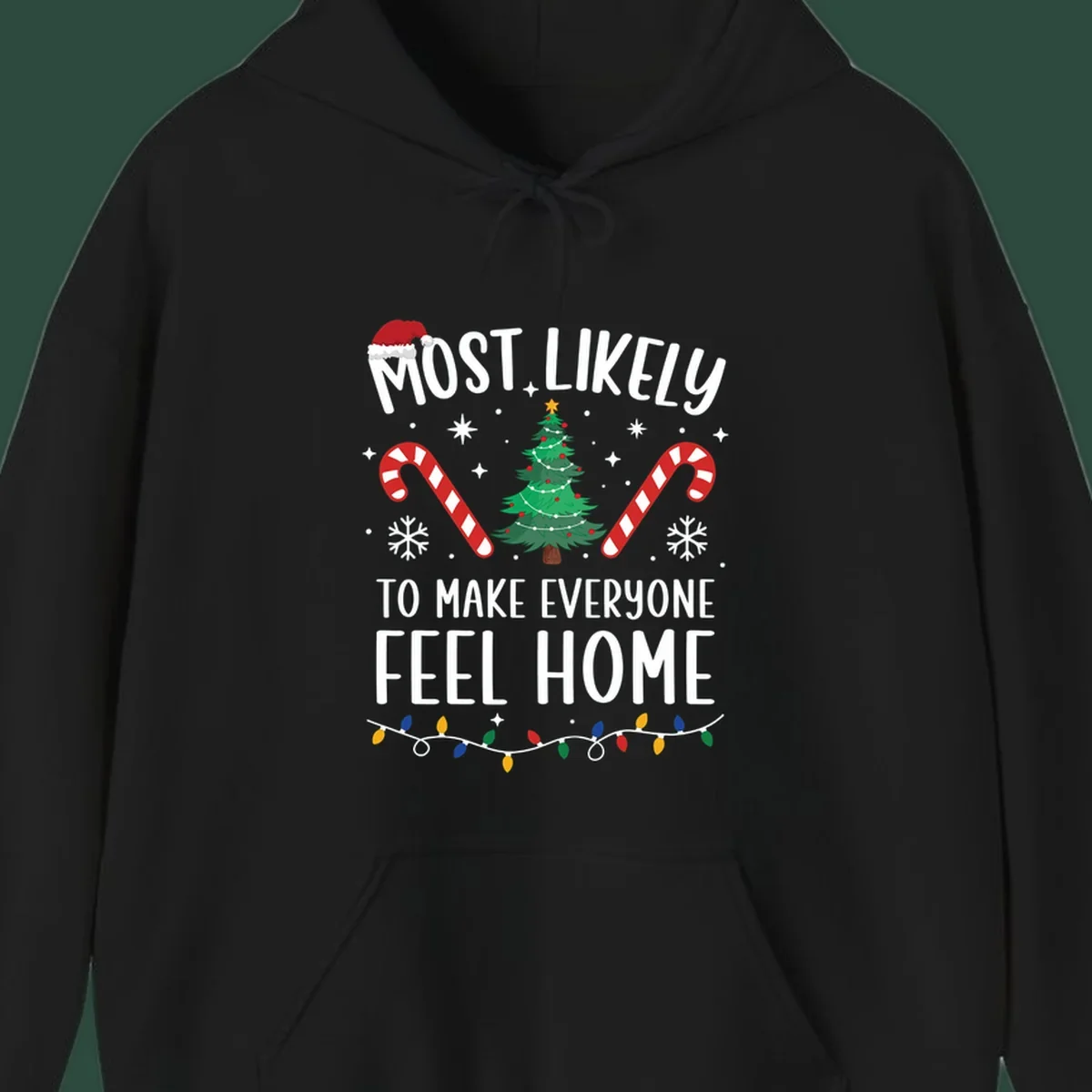 Most Likely To Make Everyone Feel Home Christmas design with Santa hat, tree, candy canes, and lights.