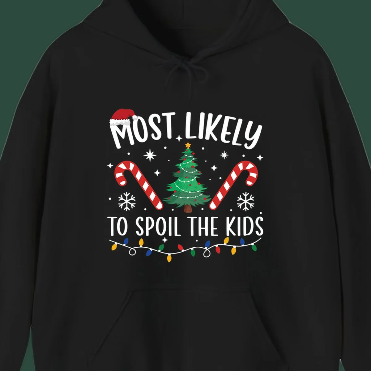 Most Likely To Spoil The Kids Christmas design with tree, candy canes, and Santa hat.