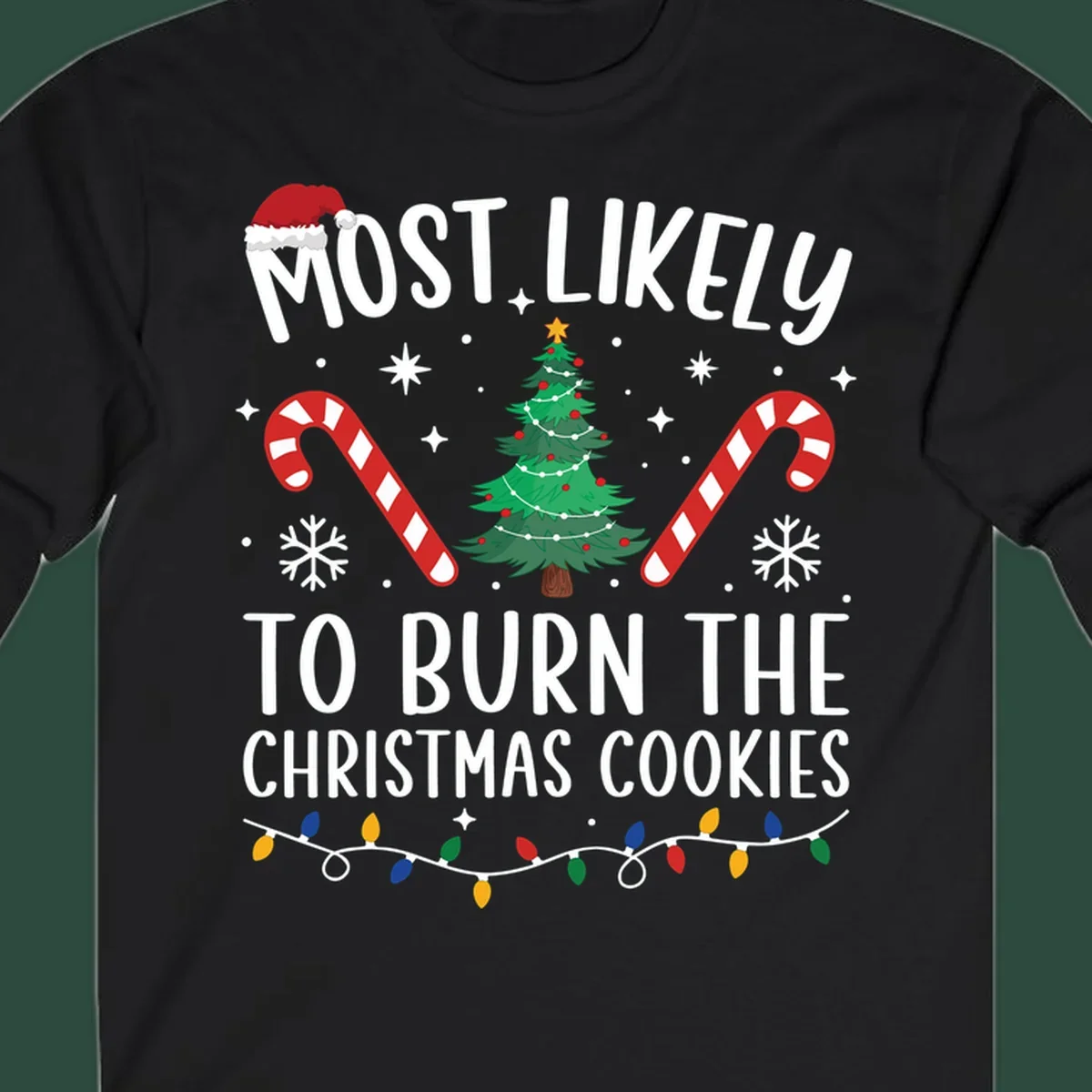 Most likely to burn Christmas Cookies text with Santa hat, Christmas tree, candy canes, snowflakes, stars, and lights. Christmas baking humor.
