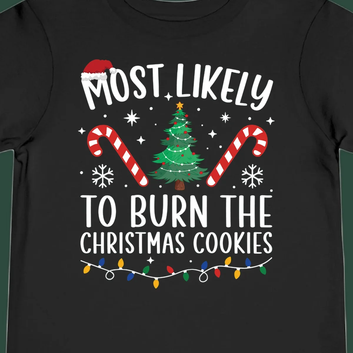 Most likely to burn Christmas Cookies text with Santa hat, Christmas tree, candy canes, snowflakes, stars, and lights. Christmas baking humor.