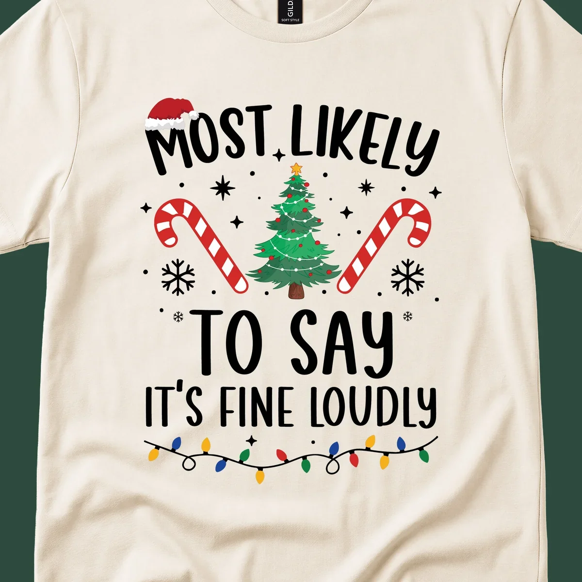 Most likely to say it's fine loudly Christmas design with tree, candy canes, and Santa hat.