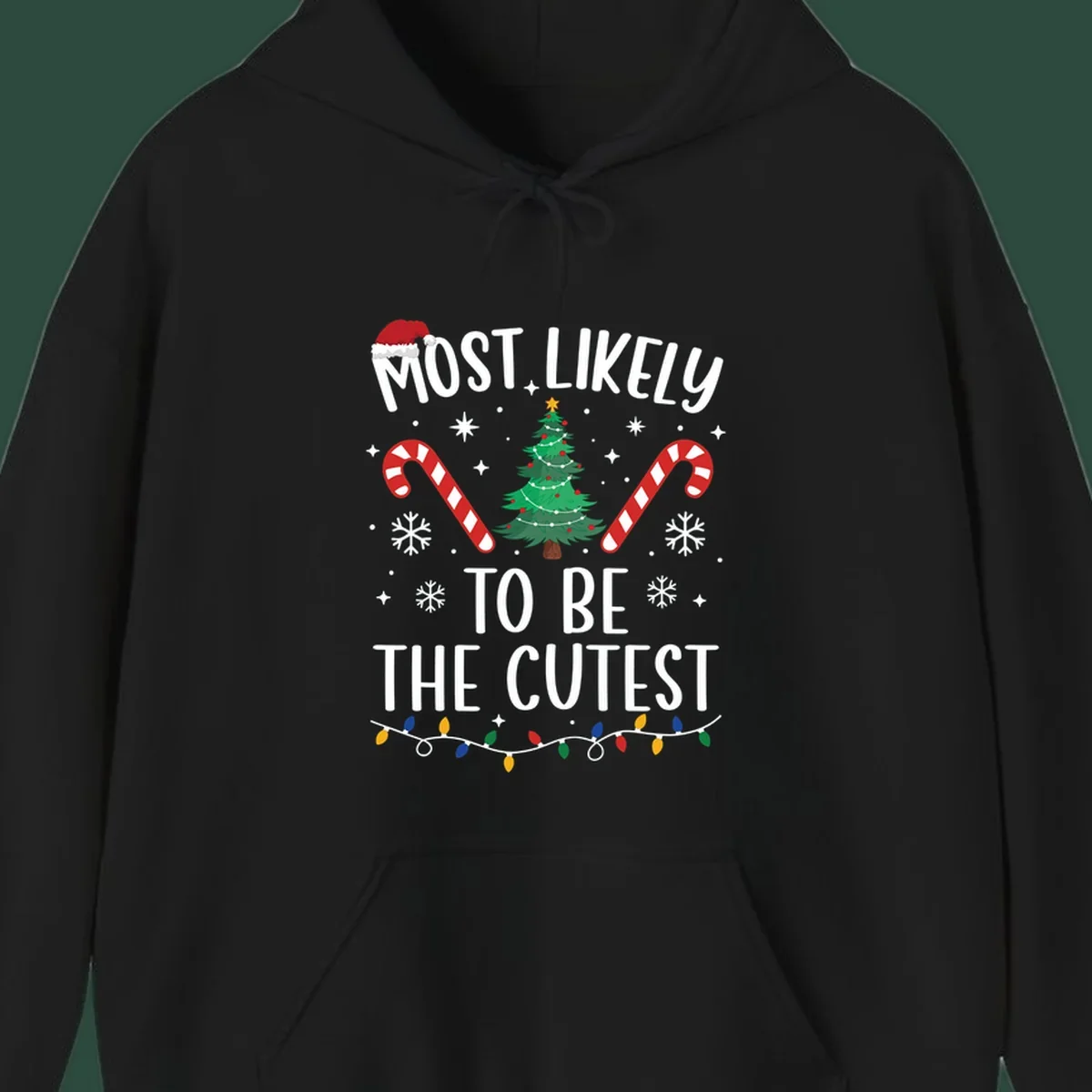 Most Likely To Be The Cutest Christmas Crew text with festive holiday graphics like a Christmas tree and Santa hat.