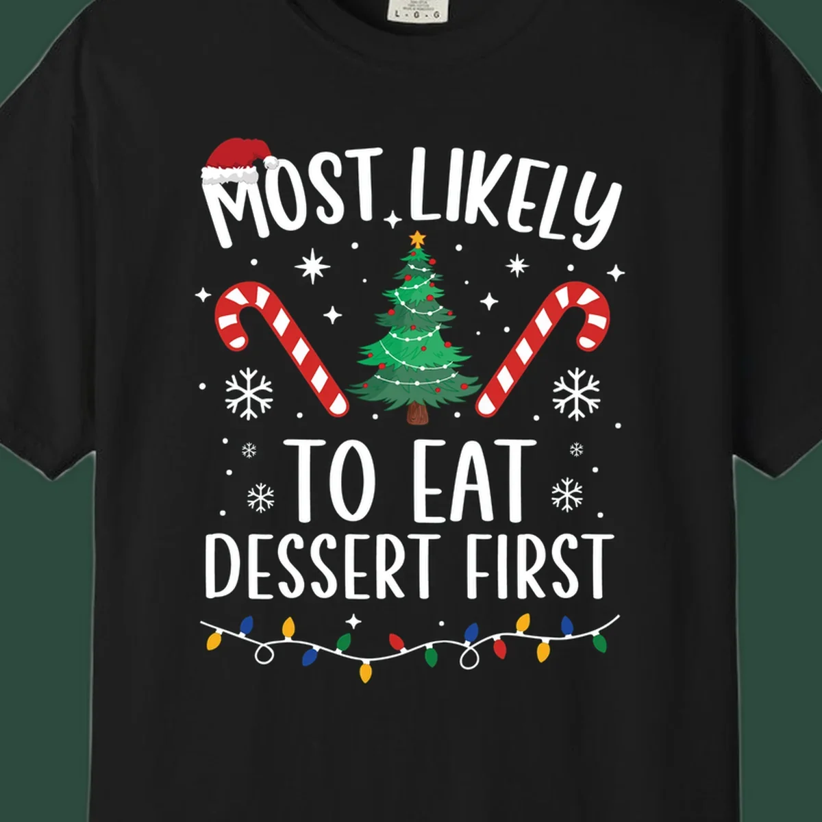 Most Likely To Eat Dessert First Christmas design with tree, candy canes, and Santa hat.