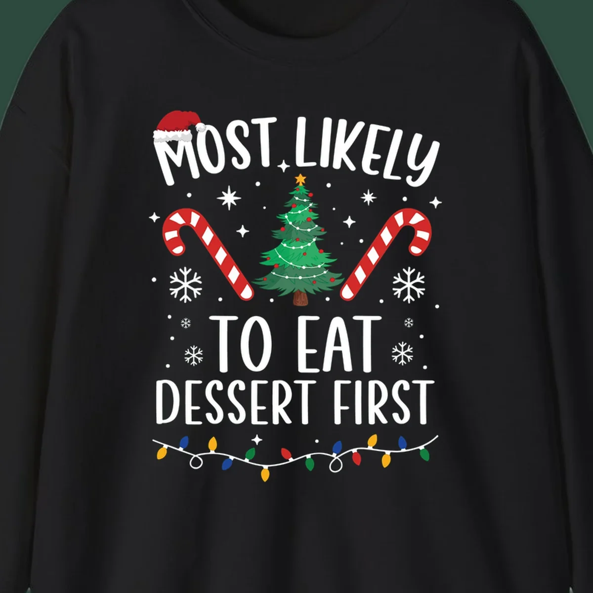 Most Likely To Eat Dessert First Christmas design with tree, candy canes, and Santa hat.