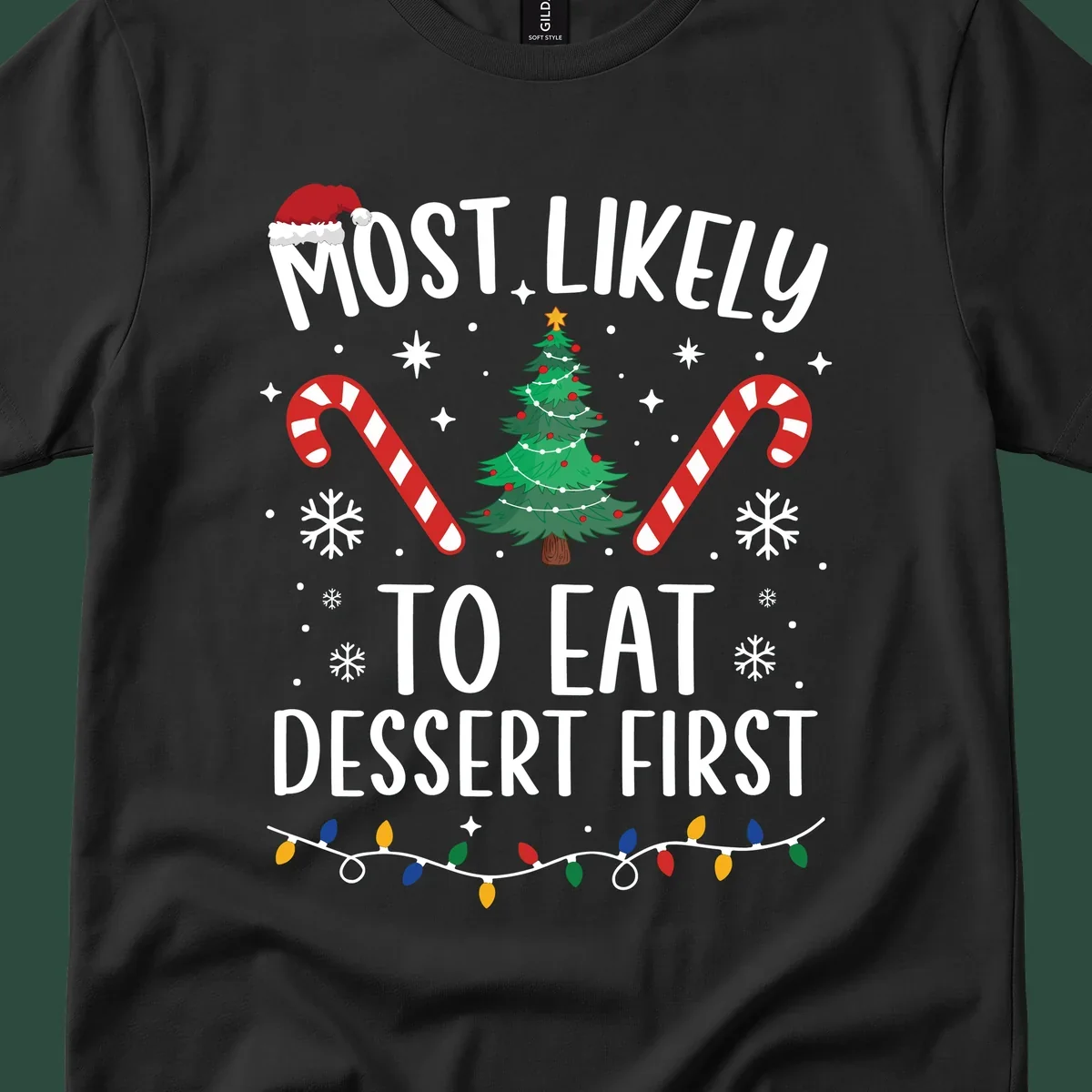 Most Likely To Eat Dessert First Christmas design with tree, candy canes, and Santa hat.