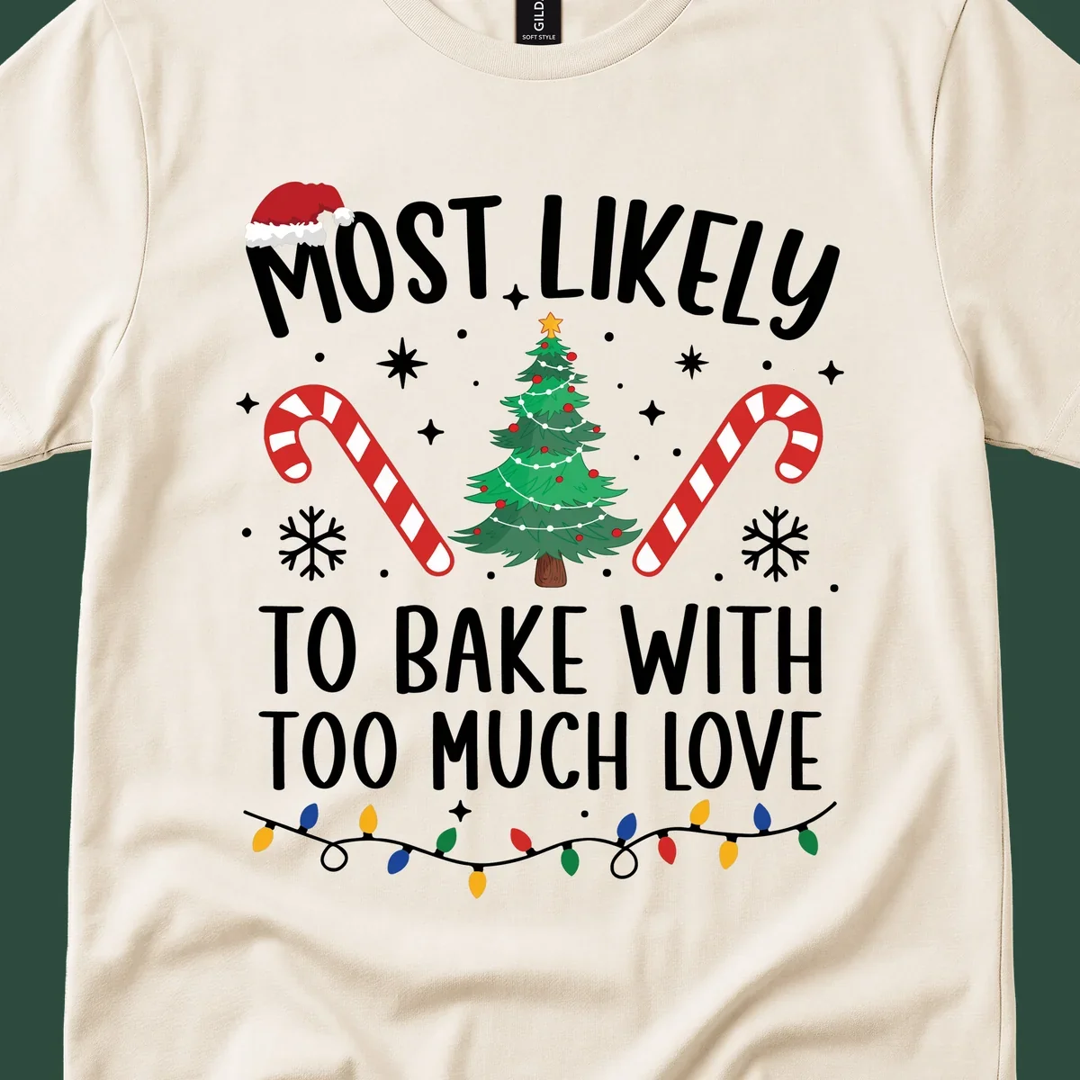 Most Likely To Bake With Too Much Love Christmas design with tree, candy canes, and Santa hat.