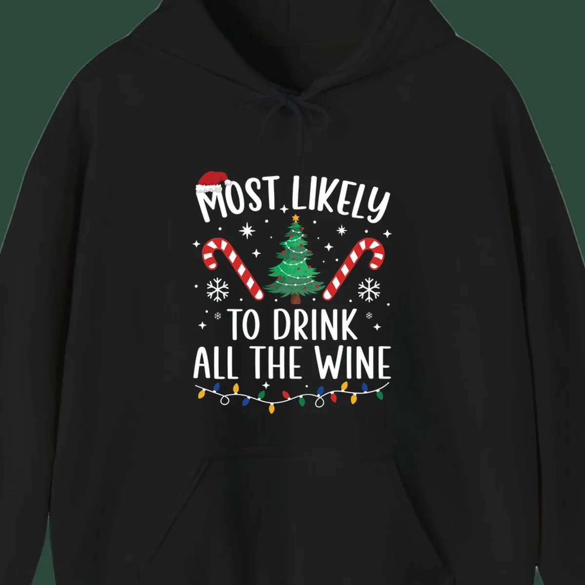 Most likely to drink all the wine Christmas design with text, tree, candy canes, and snowflakes.