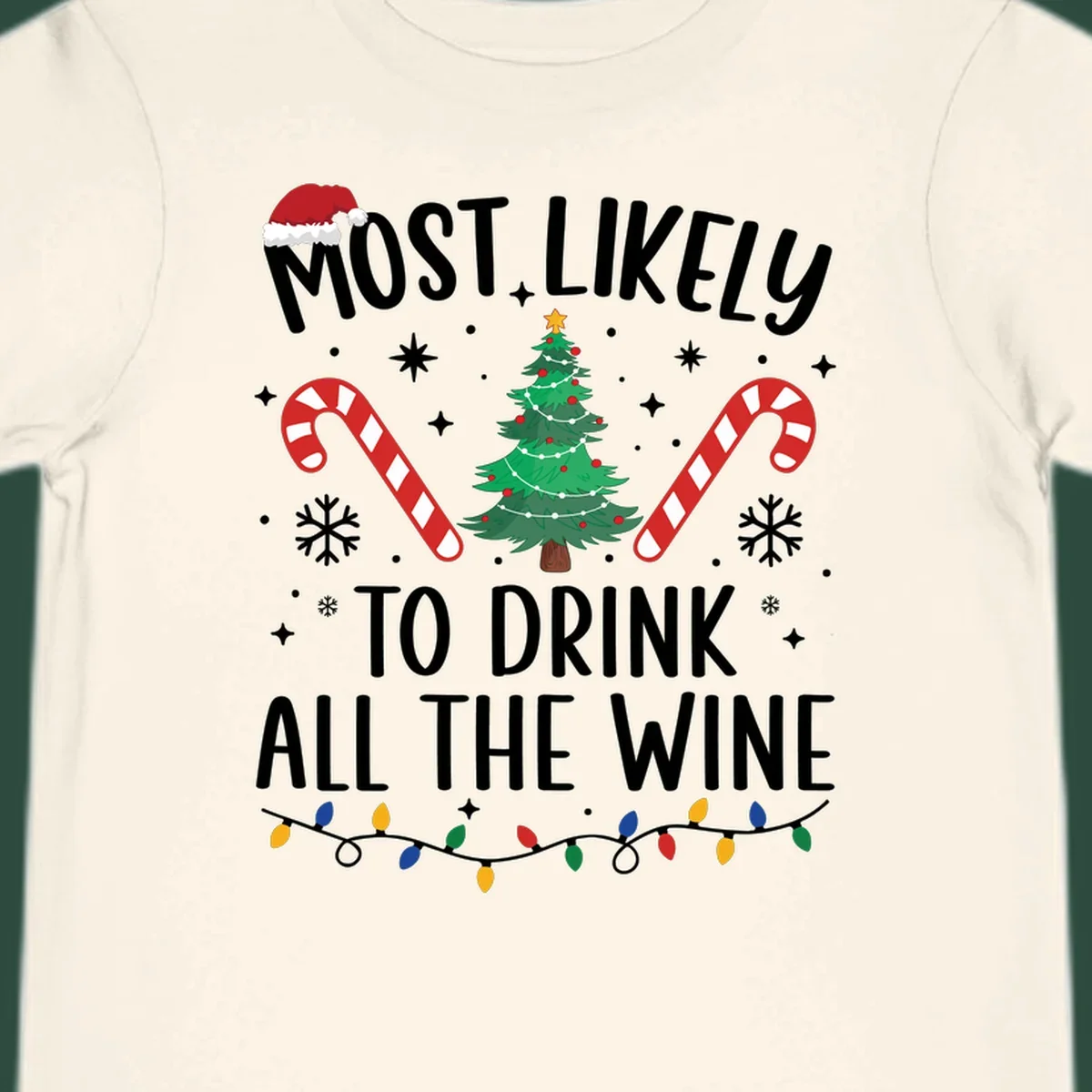 Most likely to drink all the wine Christmas design with text, tree, candy canes, and snowflakes.