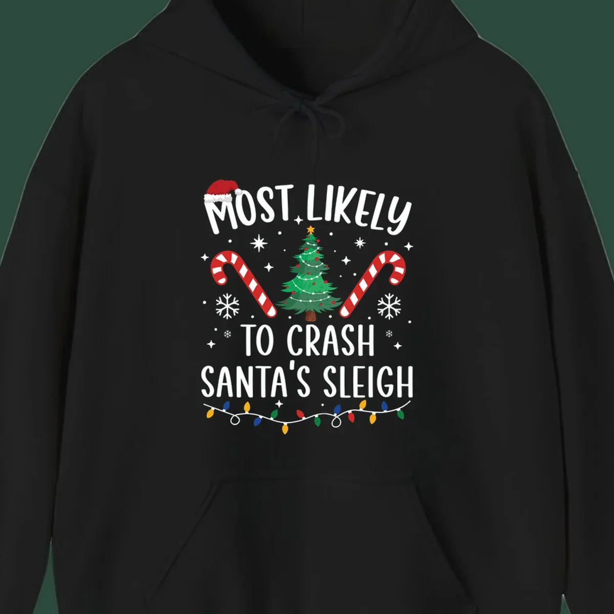 Most Likely To Crash Santa's Sleigh holiday design with Santa hat, Christmas tree, candy canes, and lights.