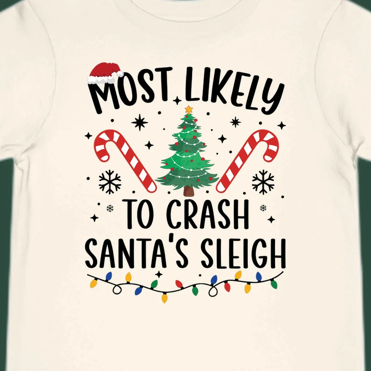 Most Likely To Crash Santa's Sleigh holiday design with Santa hat, Christmas tree, candy canes, and lights.