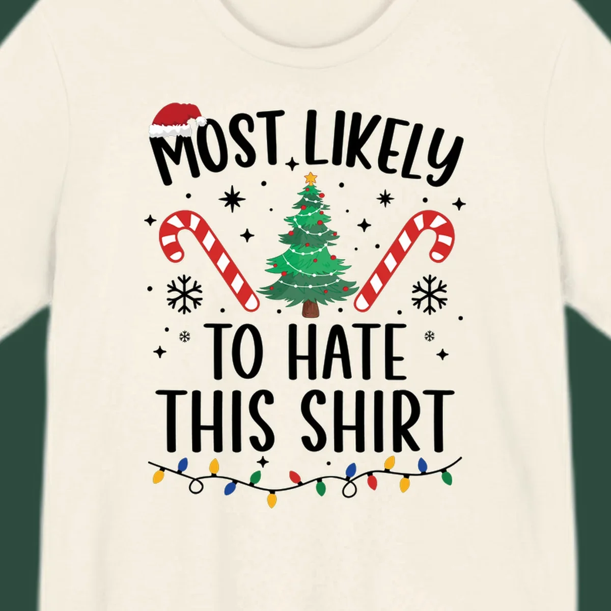 Text 'Most Likely To Hate This Shirt' with Christmas graphics like a tree, candy canes, and Santa hat.