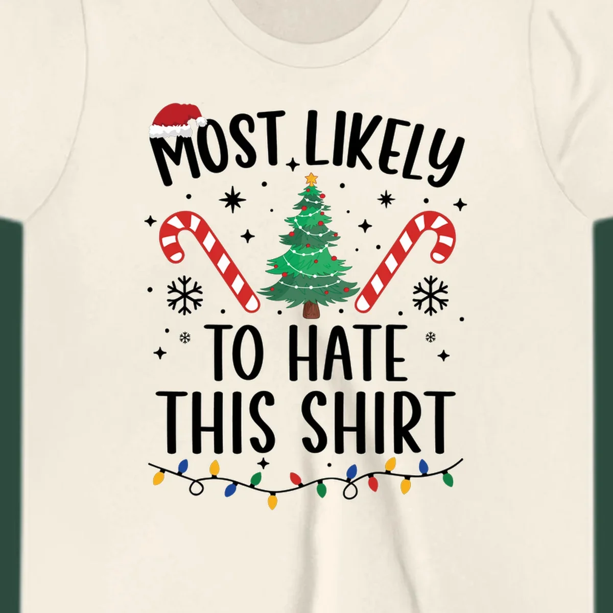 Text 'Most Likely To Hate This Shirt' with Christmas graphics like a tree, candy canes, and Santa hat.