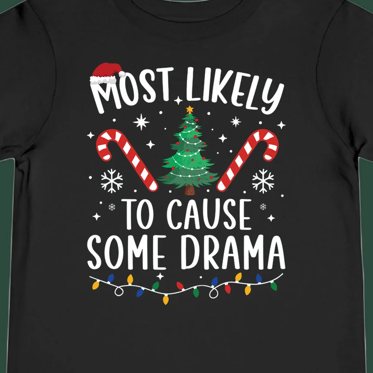 Most Likely To Cause Some Drama Christmas text with tree and decorations. Christmas crew shirt.