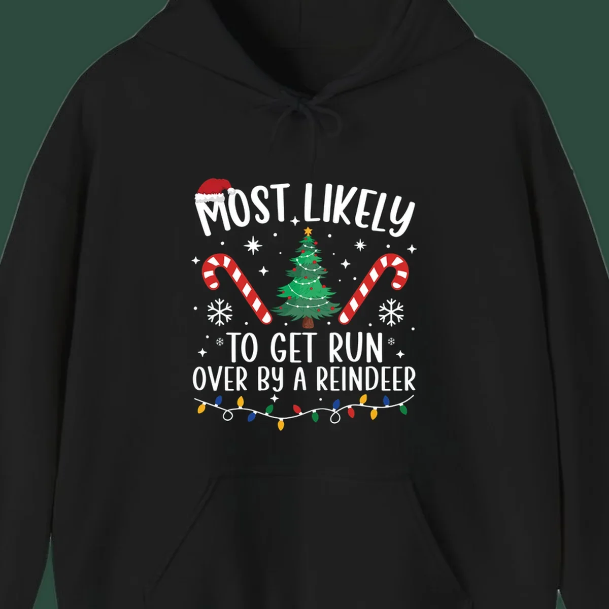 Most likely to get run over by reindeer Christmas design with tree, candy canes, and lights.