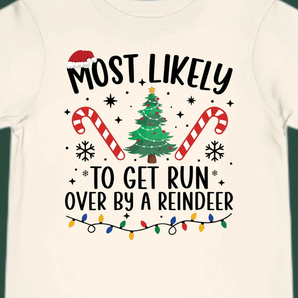 Most likely to get run over by reindeer Christmas design with tree, candy canes, and lights.