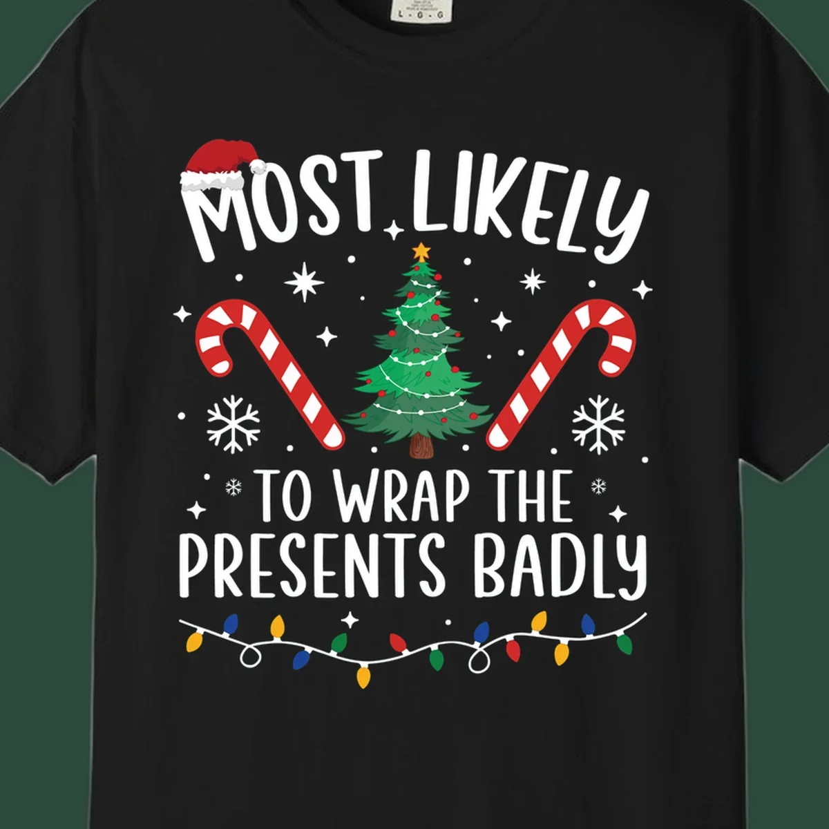 Most Likely To Wrap Presents Badly Christmas design with text, tree, candy canes, and lights.