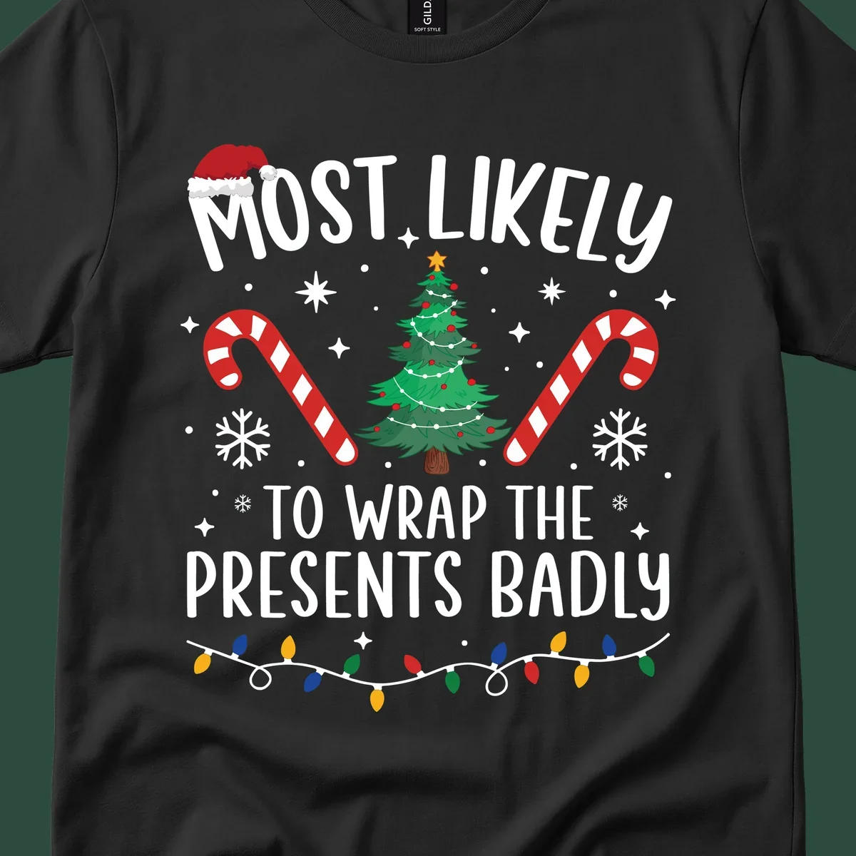Most Likely To Wrap Presents Badly Christmas design with text, tree, candy canes, and lights.