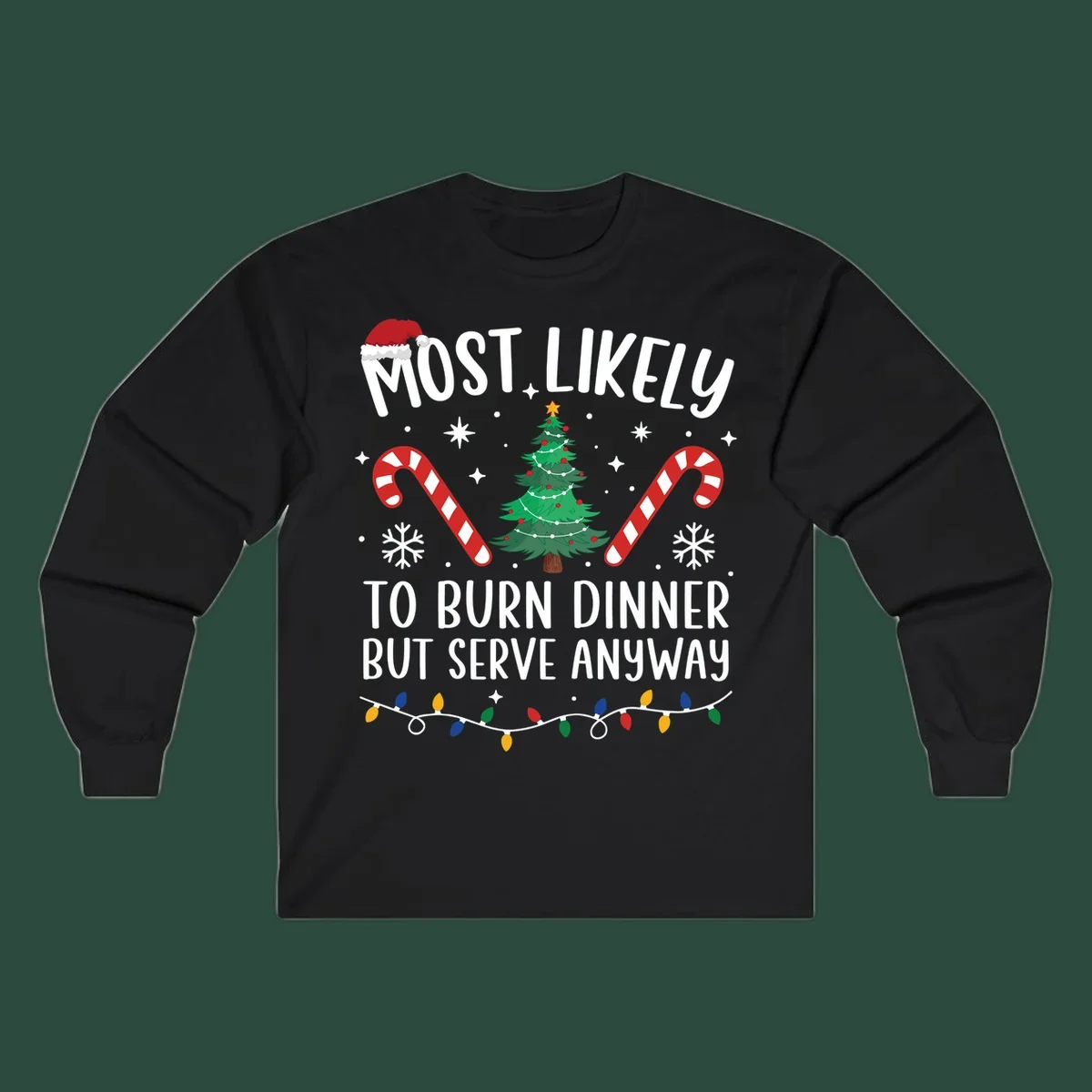 Most likely to burn dinner but serve anyway funny Christmas text with Santa hat, Christmas tree, and candy canes.