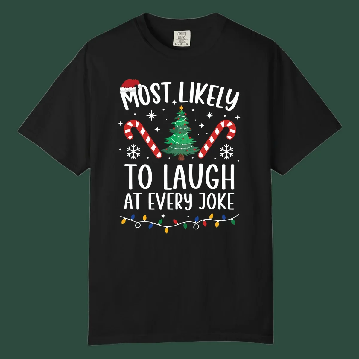 Most Likely To Laugh At Every Joke Christmas text with Santa hat, tree, candy canes, and lights.