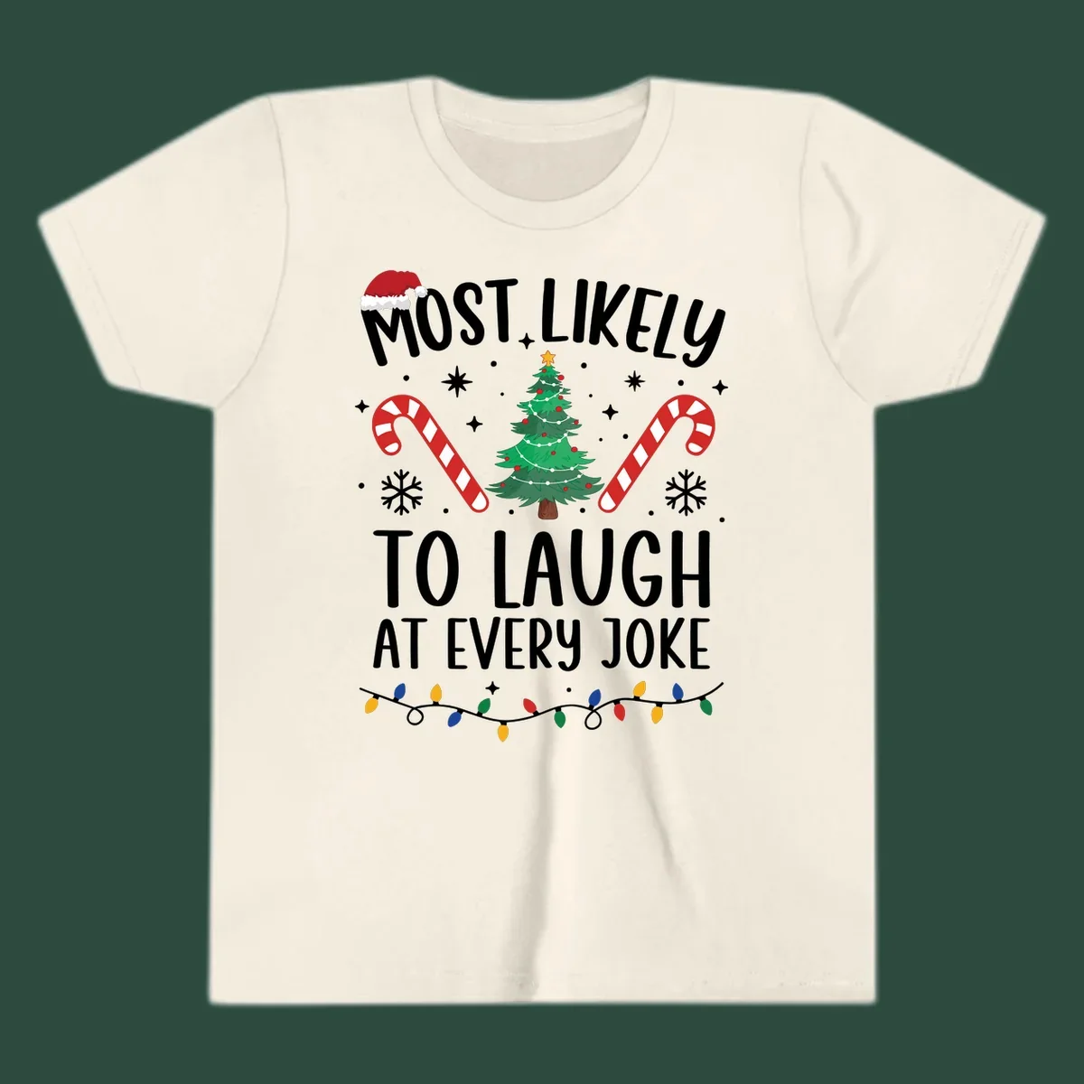Most Likely To Laugh At Every Joke Christmas text with Santa hat, tree, candy canes, and lights.