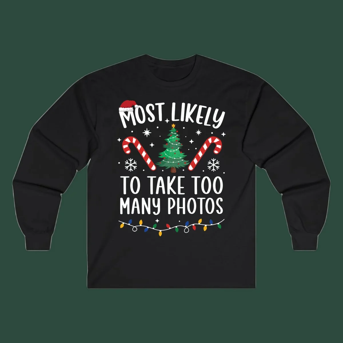 Most Likely To Take Too Many Photos Christmas design with text, candy canes, Christmas tree, and Santa hat.