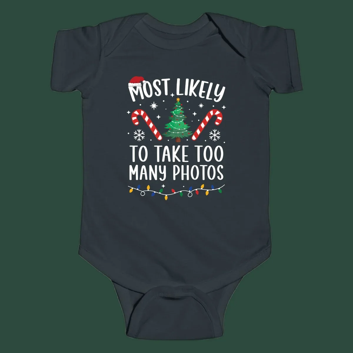 Most Likely To Take Too Many Photos Christmas design with text, candy canes, Christmas tree, and Santa hat.