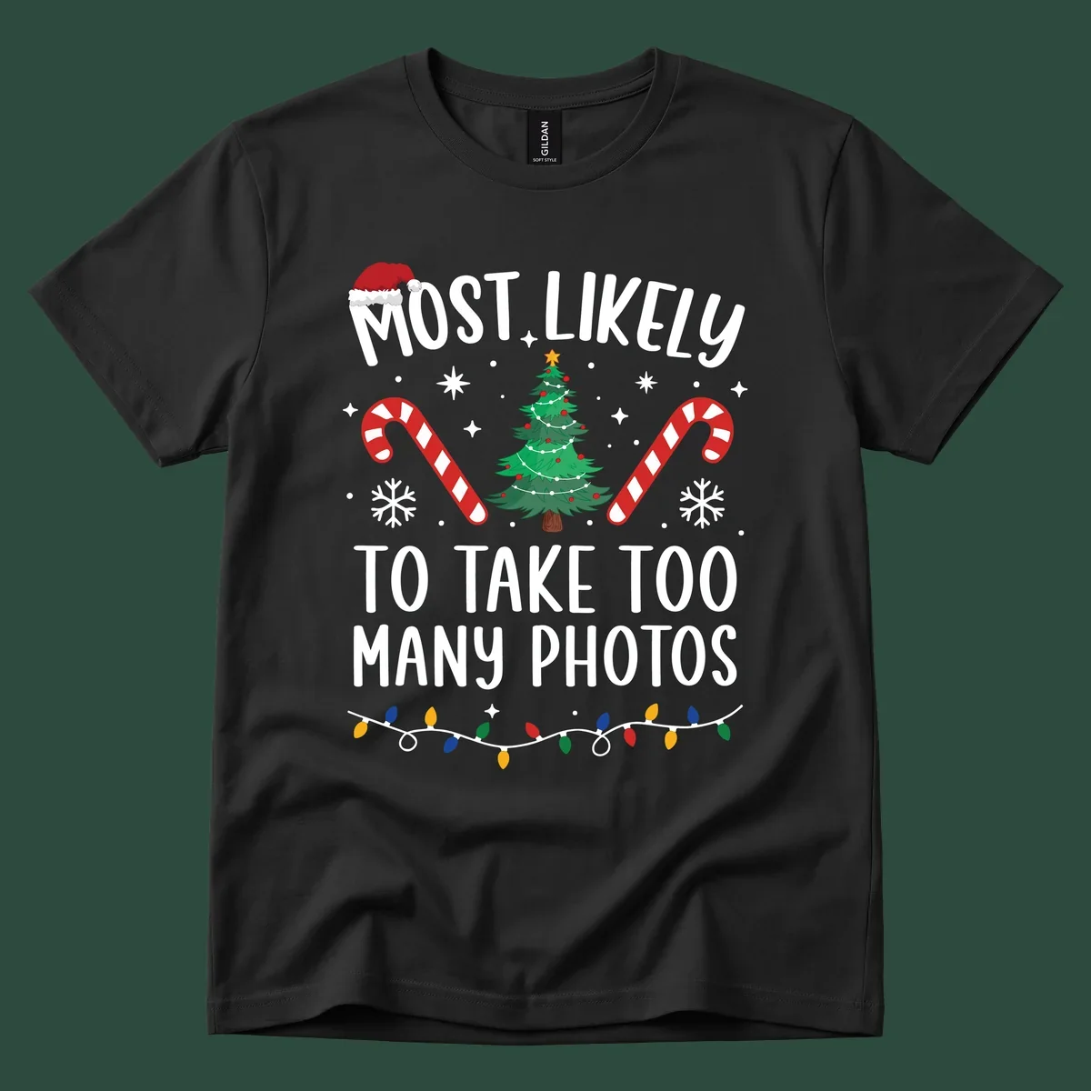 Most Likely To Take Too Many Photos Christmas design with text, candy canes, Christmas tree, and Santa hat.