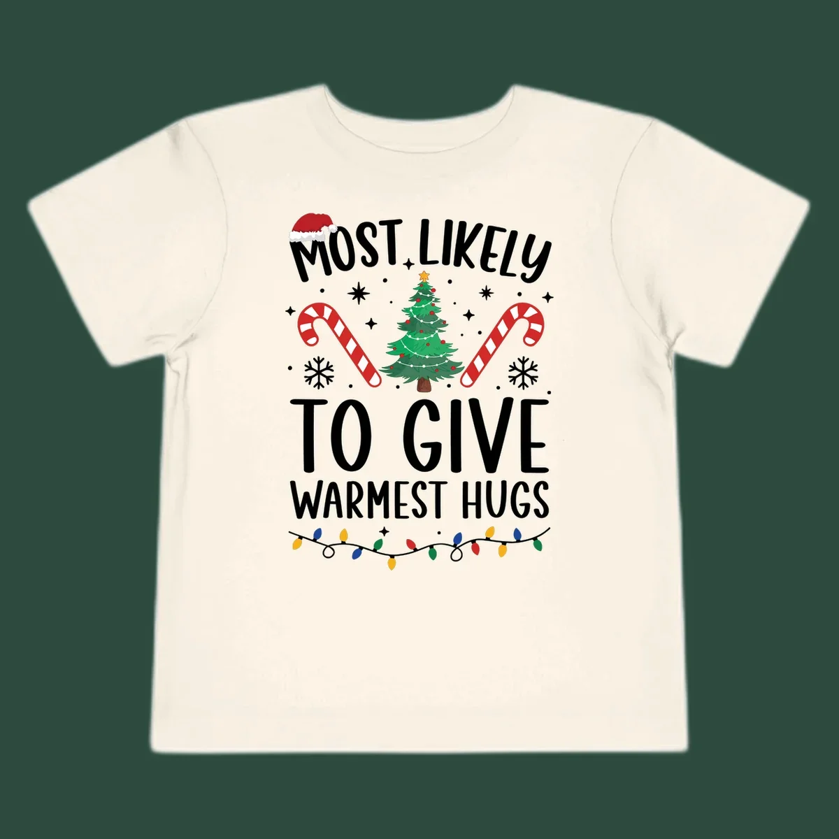 Christmas 'Most Likely To Give Warmest Hugs' design with tree, candy canes, and lights.